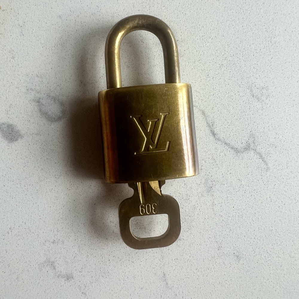Authentic Louis Vuitton Padlock with key, #309.